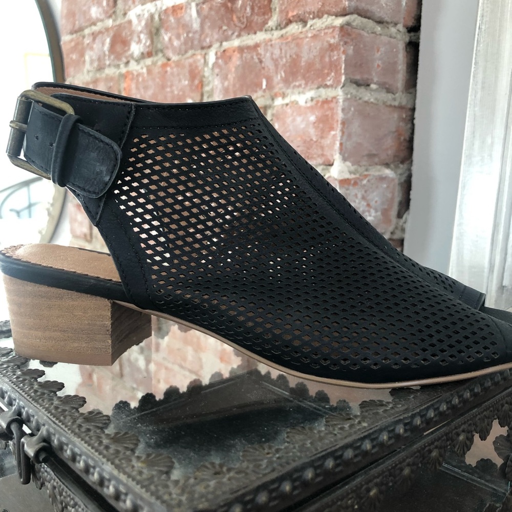RESTRICTED … black sandals
